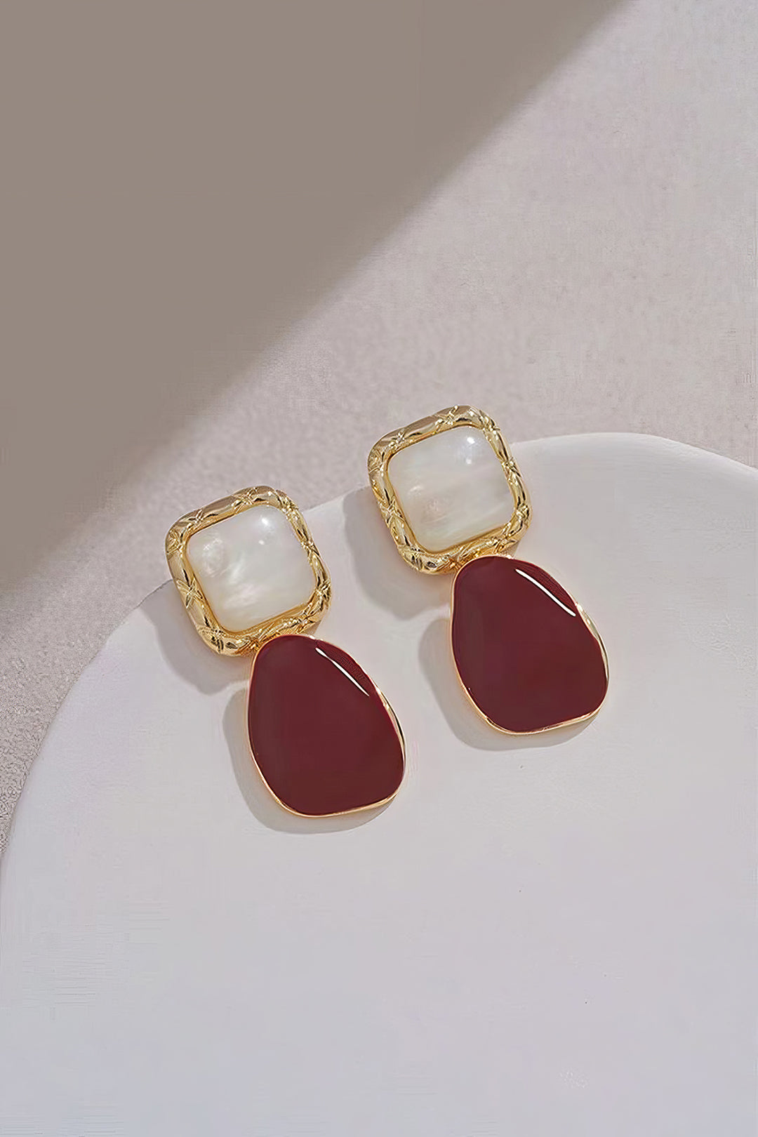 Asymmetrical square earrings