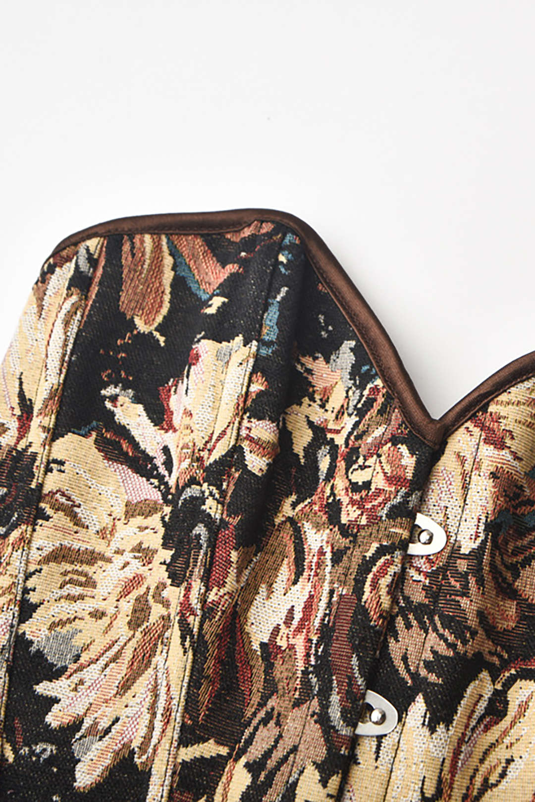 Korsettop met abstracte print en gevlochten stropdas