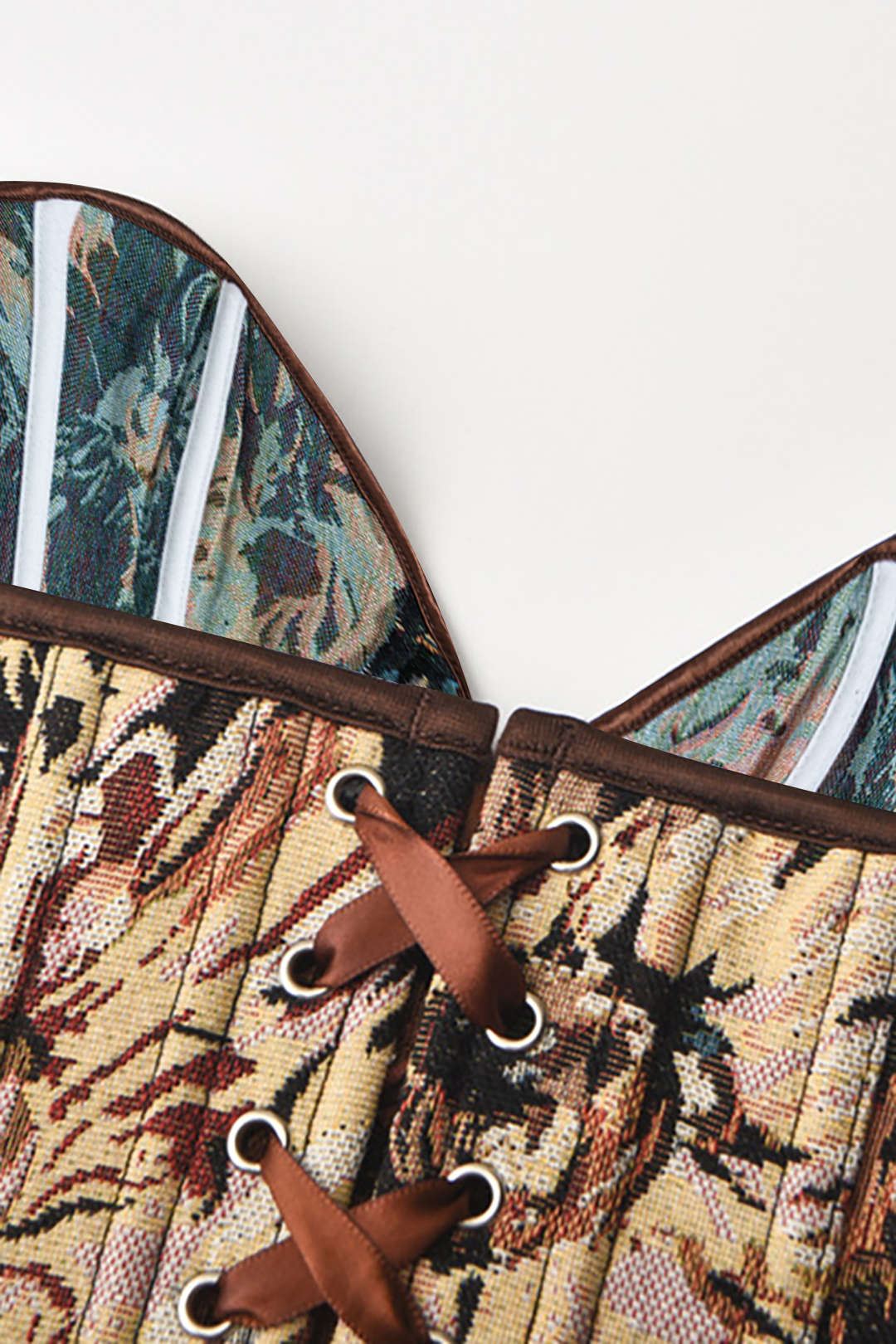 Korsettop met abstracte print en gevlochten stropdas