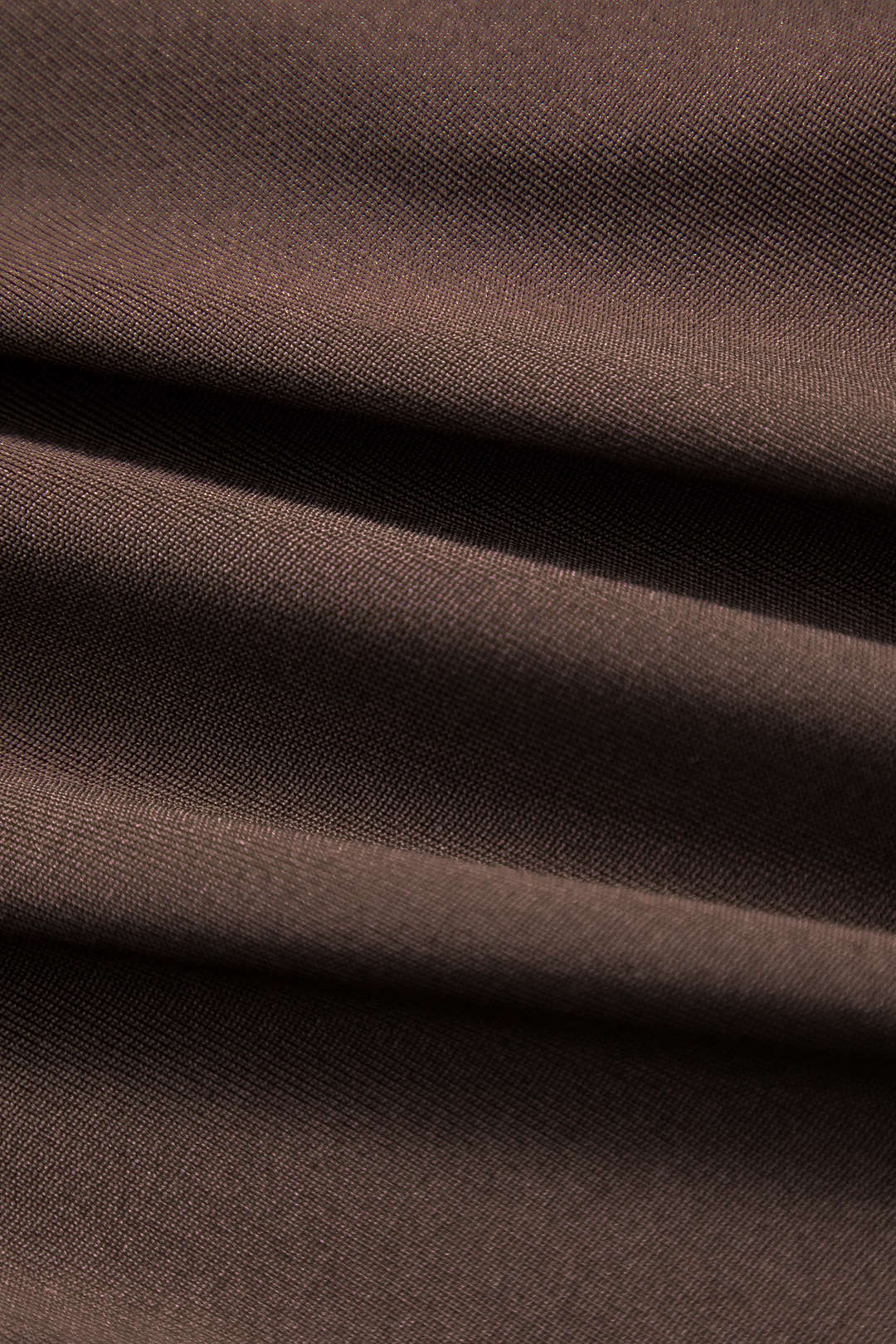 Asymmetric patchwork ruffled cut-out bodysuit with long sleeves