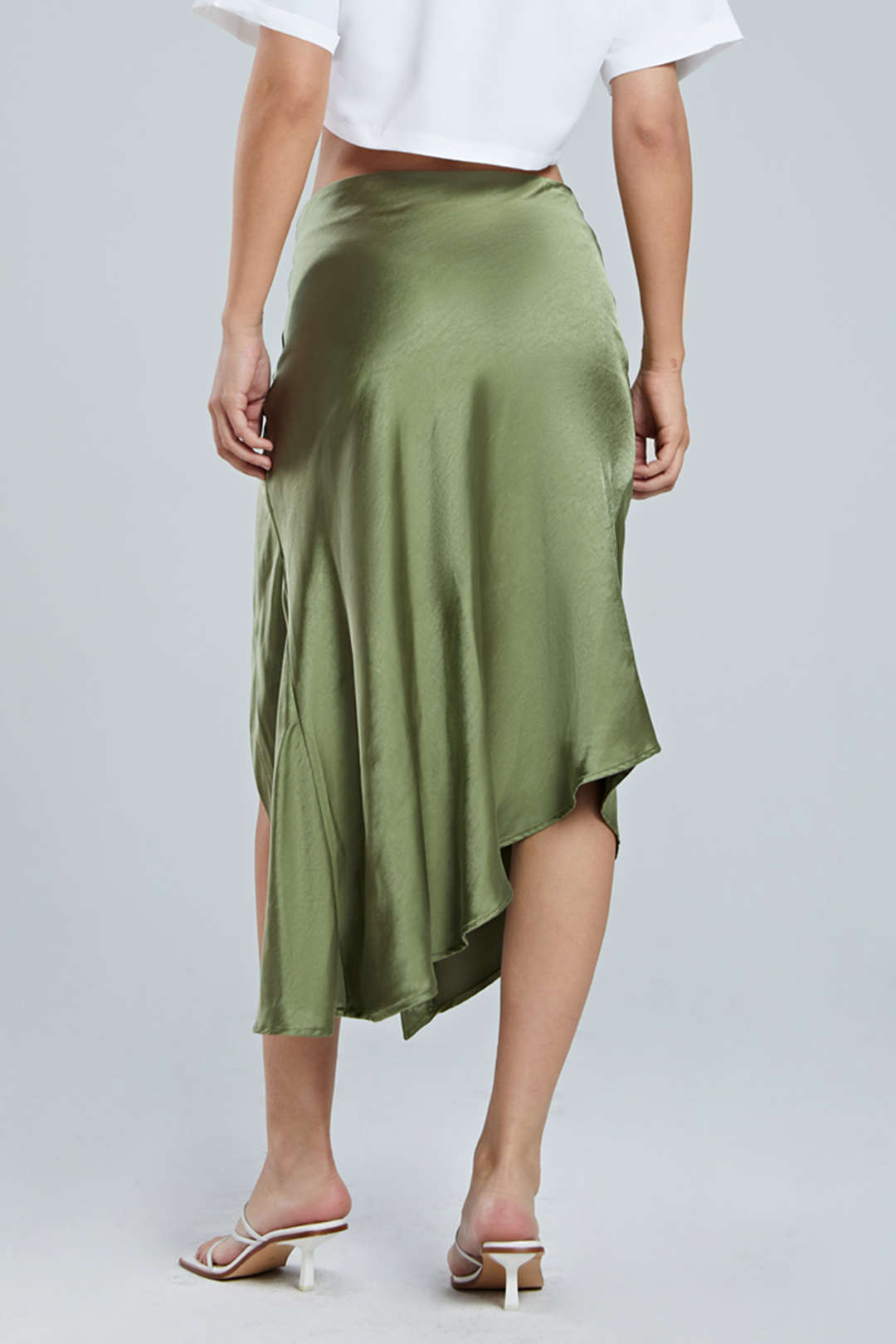 Decorative skirt with asymmetric hem and split button