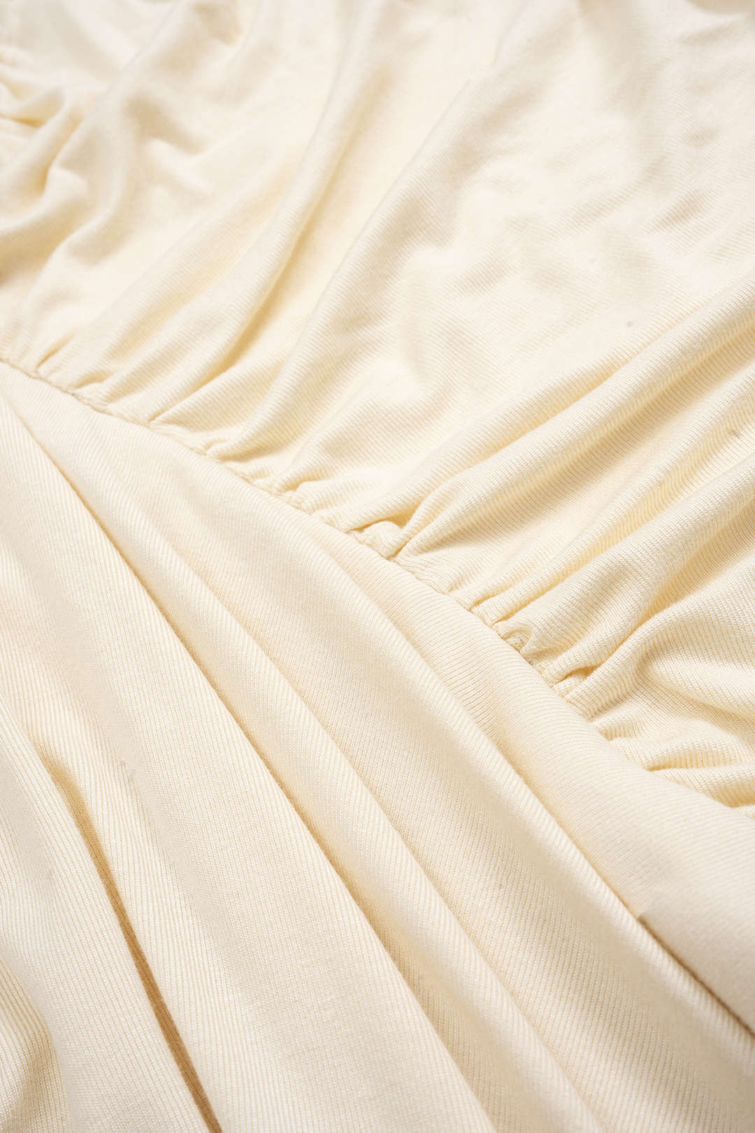 Asymmetrische twist knoop mouwloze midi -jurk