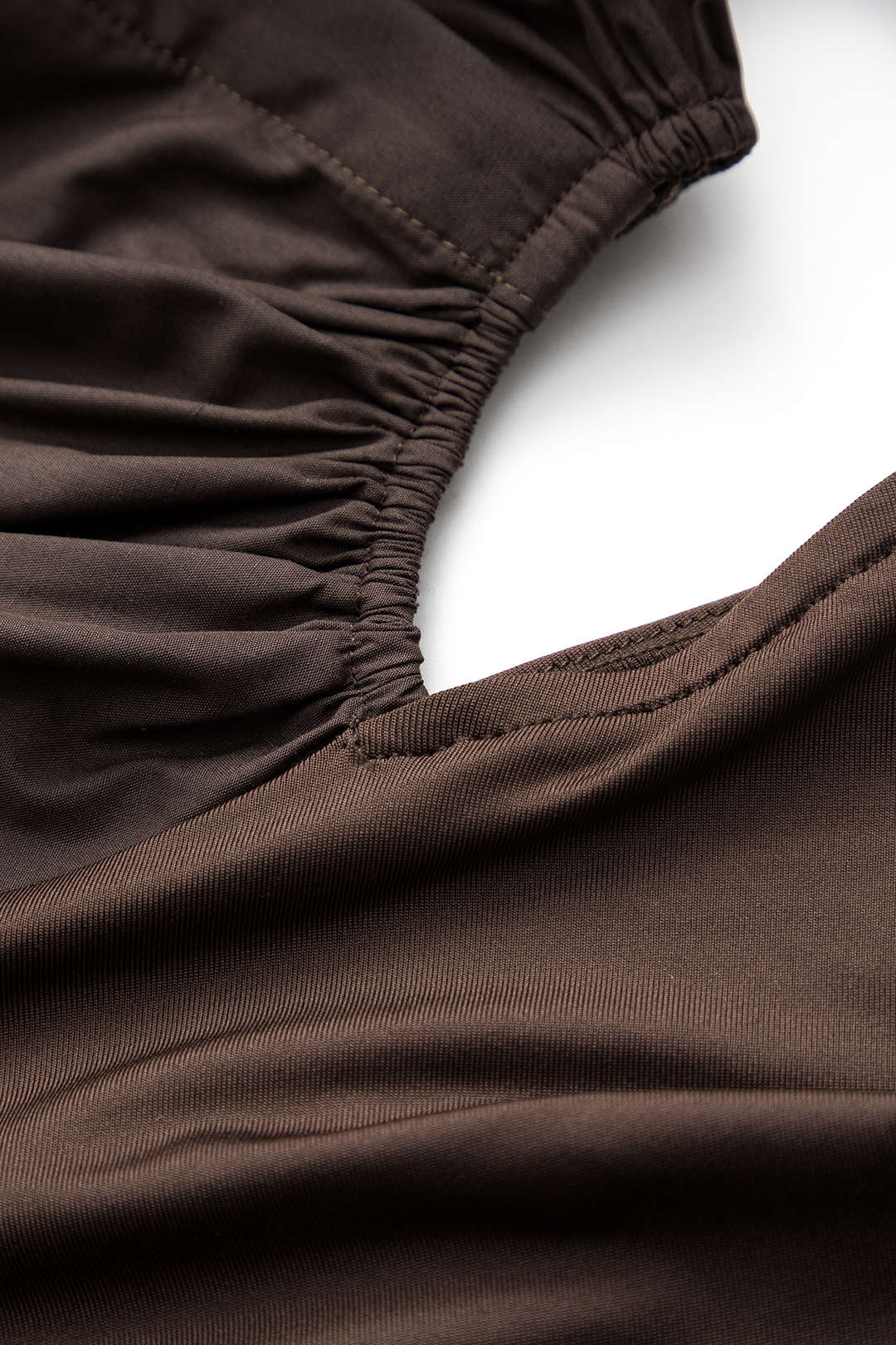 Asymmetric patchwork ruffled cut-out bodysuit with long sleeves 