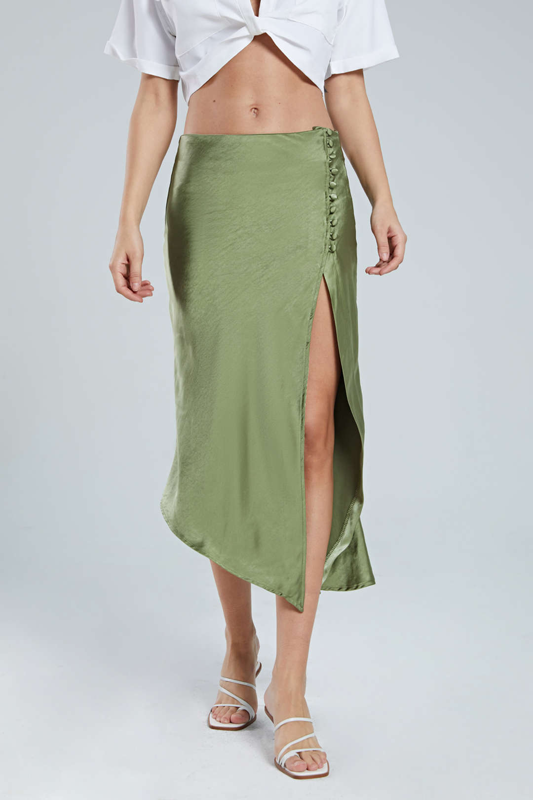 Decorative skirt with asymmetric hem and split button 