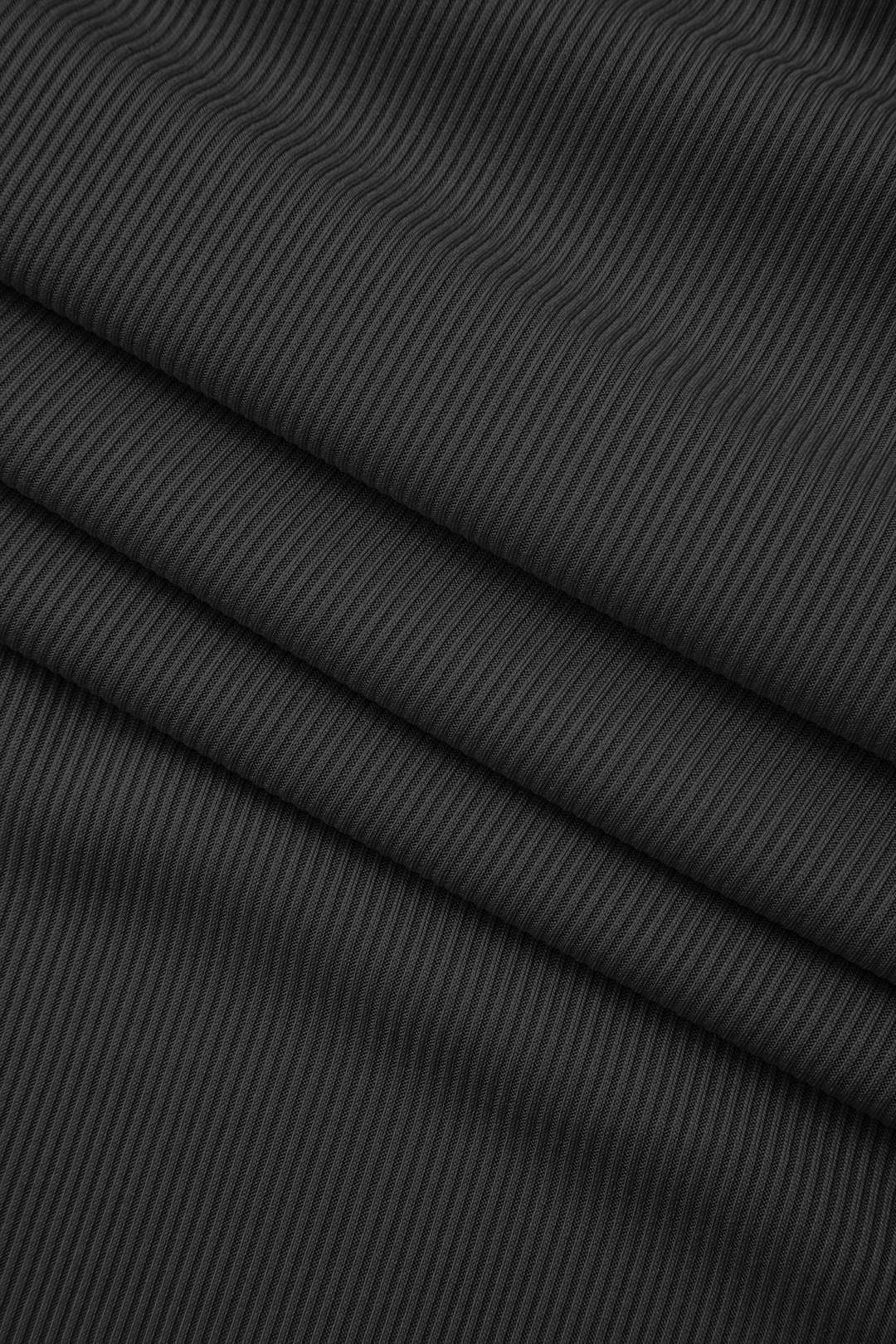 Asymmetric twist top and high-waisted maxi skirt set 