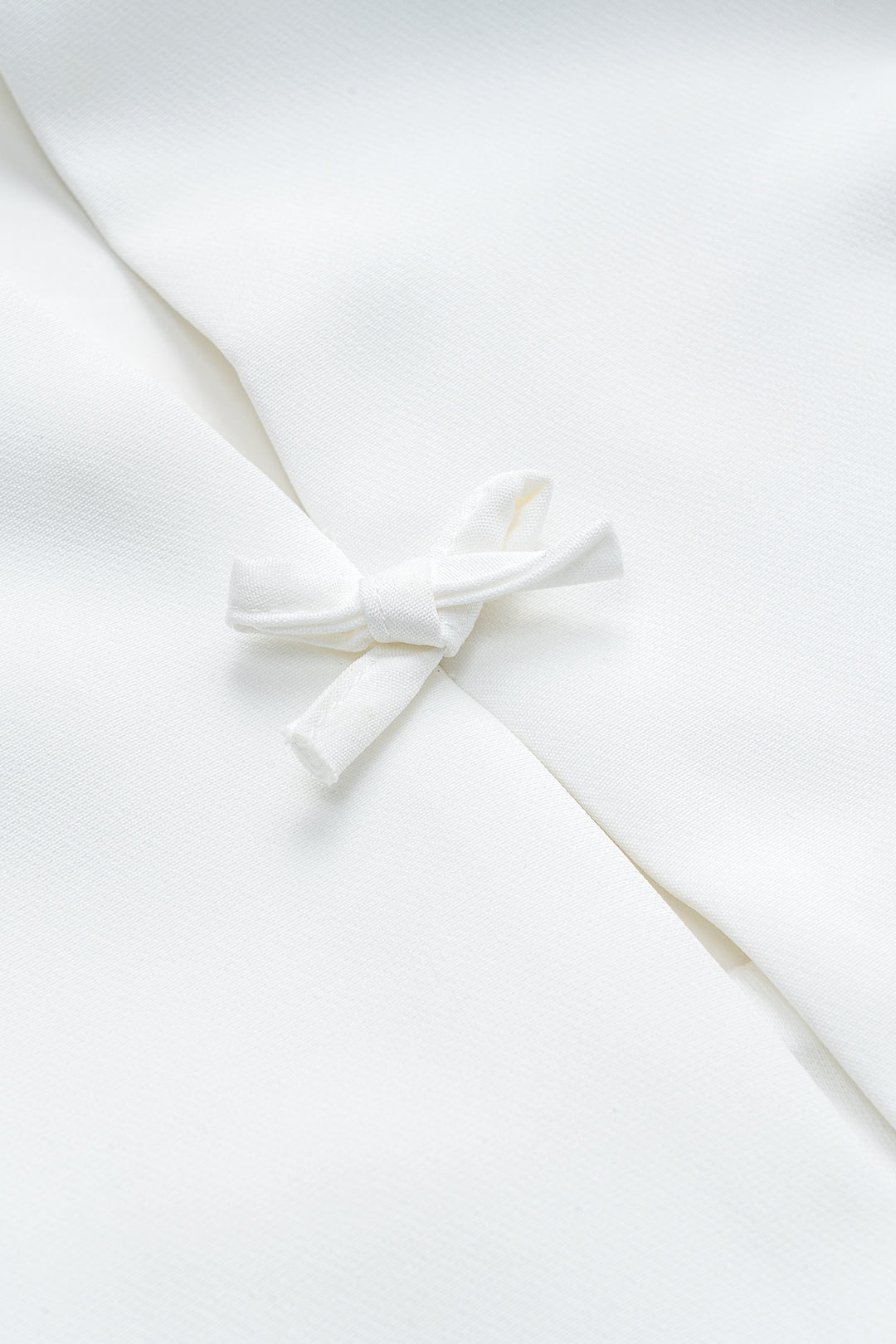 Bow pleated cut-out backless tank top 