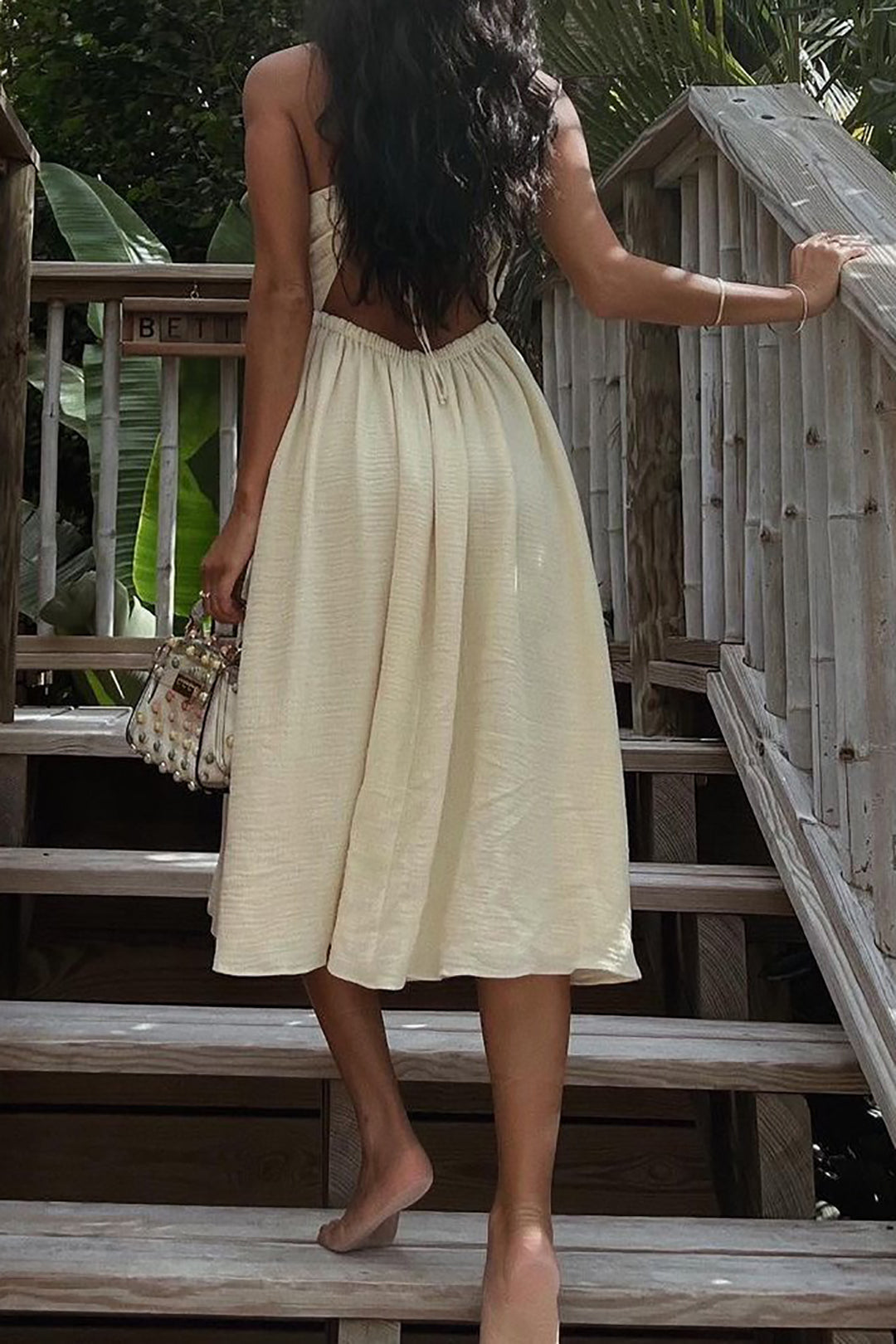 Backless midi dress with a V-neck slit 